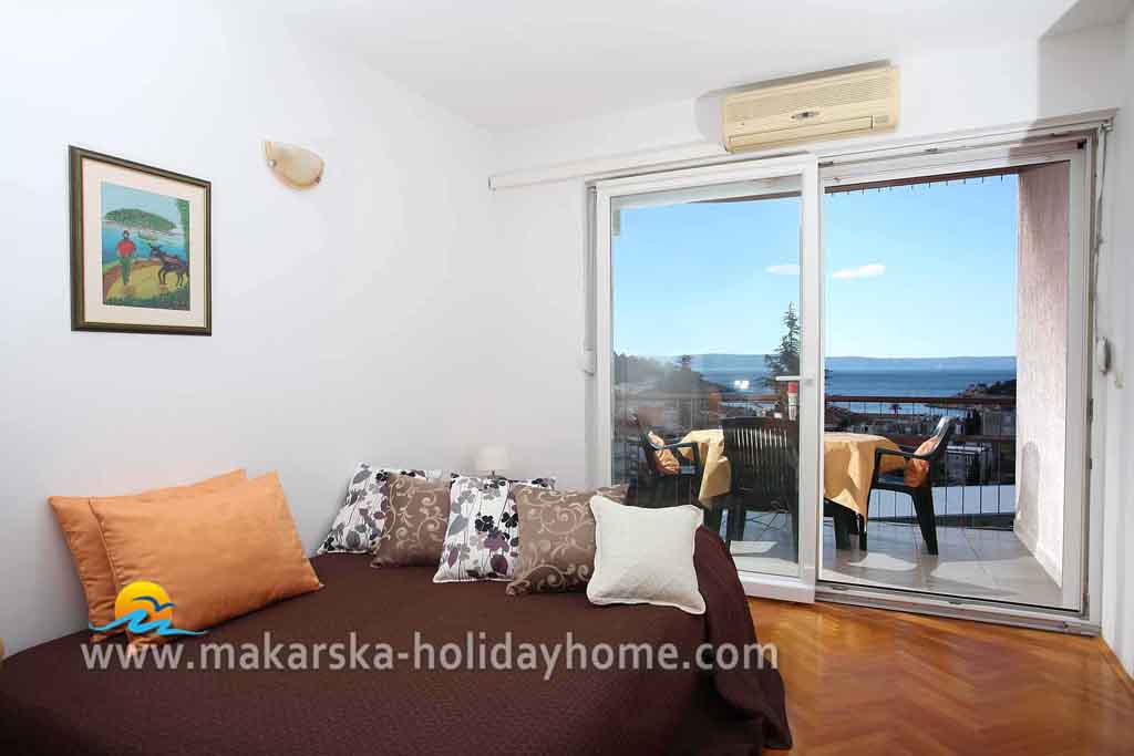 Dnevni boravak i balkon - Apartman Marino / 10