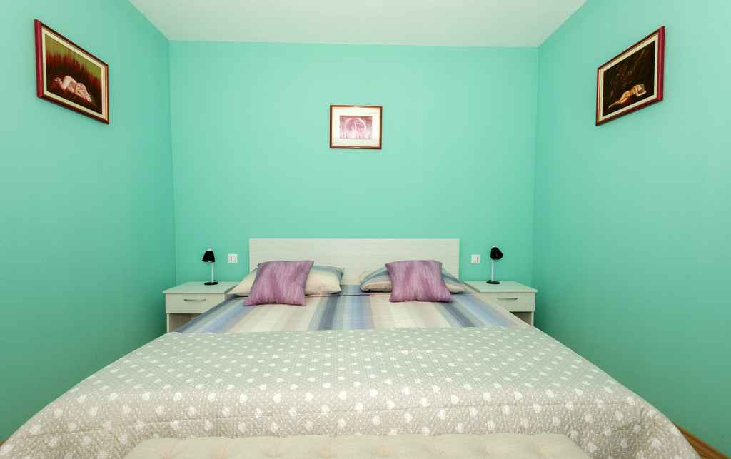 Schlafzimmer mit Doppelbett - Apartment Ratko A1 / 10