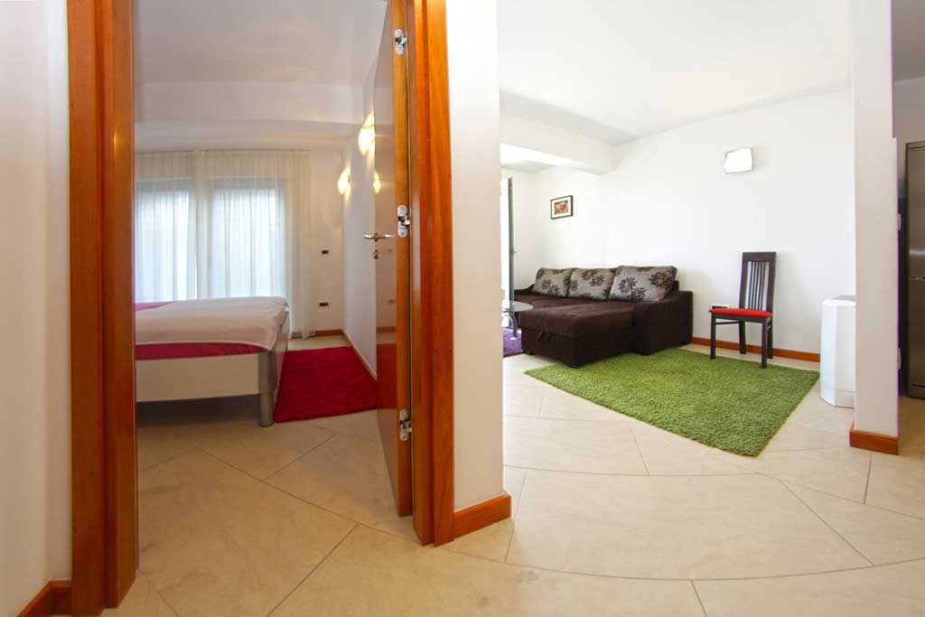 Living room and bedroom - Apartment Milan A2 / 08