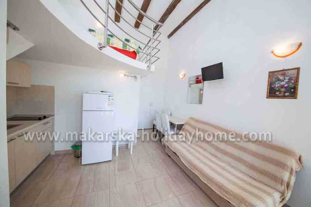 Wohnzimmer mit Schlafsofa - Appartement Boris A1 / 08